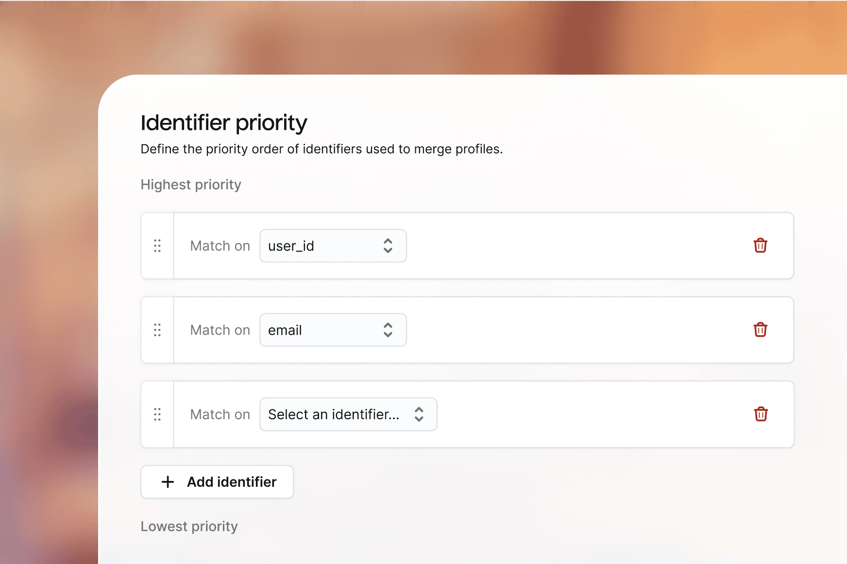 Illustration showing an representation of the visual rule builder UI from the Hightouch application. The example shows a rule that will merge records when an "Anonymous ID" matches exactly, or when a "Name" matches exactly and a "Zip code" matches exactly, with the option to add more identifiers to continue building the rule.